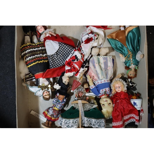 350 - A LARGE COLLECTION OF DOLLS FROM AROUND THE WORLD