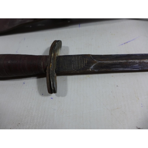 306 - A VINTAGE STILETTO KNIFE AND LEATHER SCABBARD, 18.5CM BLADE, LENGTH 49CM. BLADE STAMPED OASE.