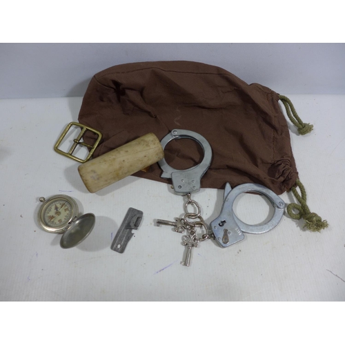 329 - A PAIR OF HANDCUFFS WITH KEYS, COMPASS, BRASS BUCKLE ETC