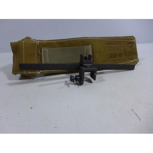 331 - A WORLD WAR II GUNSIGHT DATED 1941 IN A CANVAS CASE