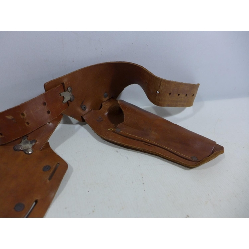 340 - A LEATHER GUN HOLSTER AND BELT