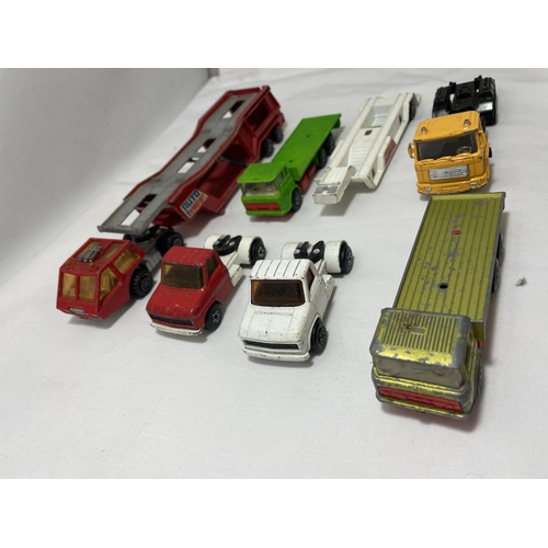 335 - A QUANTITY OF MATCHBOX CAR TRANSPORTER TRUCKS AND FURTHER TRUCKS