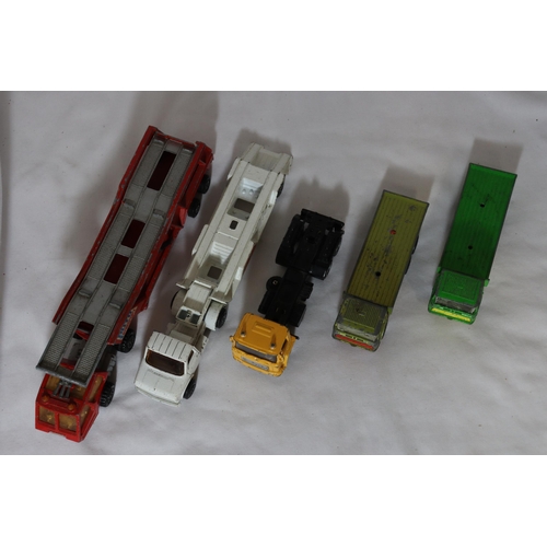 335 - A QUANTITY OF MATCHBOX CAR TRANSPORTER TRUCKS AND FURTHER TRUCKS