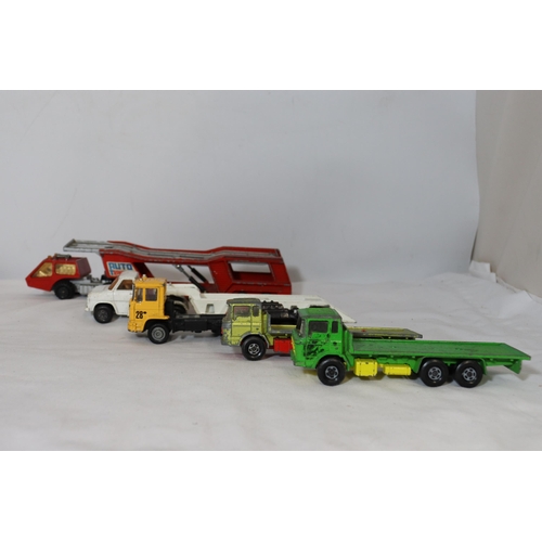 335 - A QUANTITY OF MATCHBOX CAR TRANSPORTER TRUCKS AND FURTHER TRUCKS