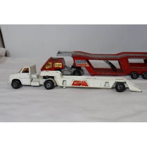 335 - A QUANTITY OF MATCHBOX CAR TRANSPORTER TRUCKS AND FURTHER TRUCKS