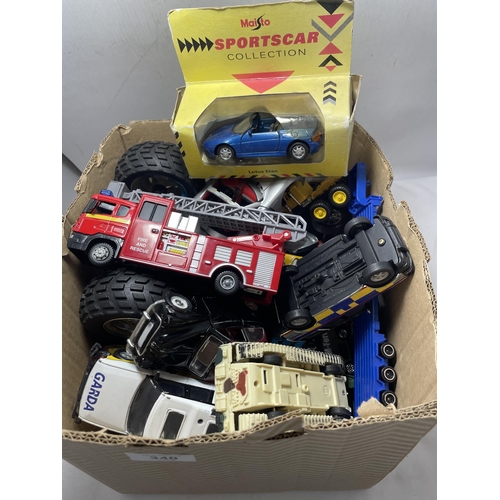 340 - A QUANTITY OF TOY VEHICLES TO INCLUDE FIRE ENGINES, POLICE CARS, MILITARY, ETC