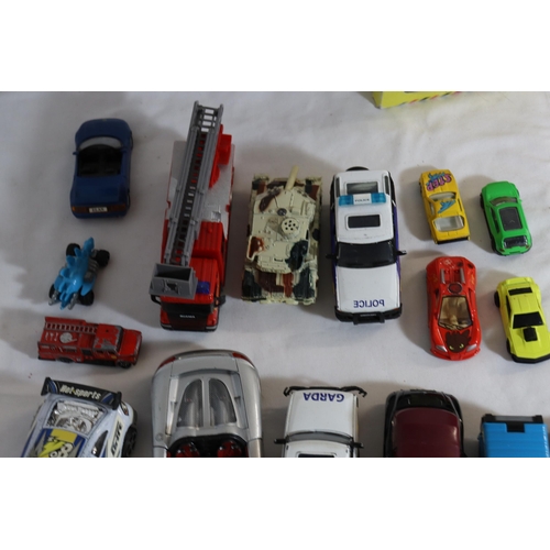 340 - A QUANTITY OF TOY VEHICLES TO INCLUDE FIRE ENGINES, POLICE CARS, MILITARY, ETC