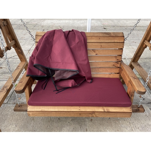 203 - AN AS NEW EX DISPLAY CHARLES TAYLOR GARDEN FURNITURE SWING SEAT WITH CUSHION AND COVER PLUS VAT