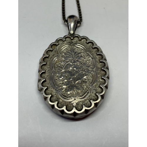 539 - A WWI SILVER LOCKET AND CHAIN