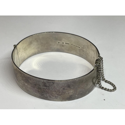 540 - A HALLMARKED BIRMINGHAM SILVER BANGLE