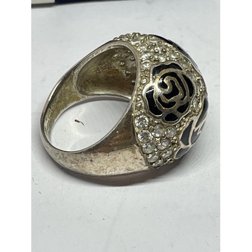 549 - A SILVER RING WITH CUBIC ZIRCONIAS IN A PRESENTATION BOX