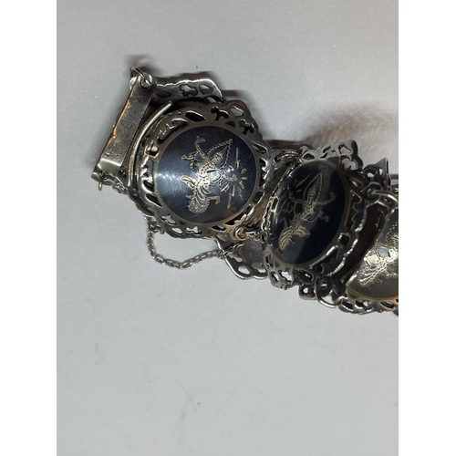 589 - A SIAM SILVER BRACELET IN A PRESENTATION BOX