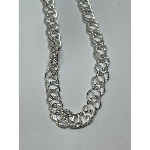 592 - TWO SILVER NECKLACES