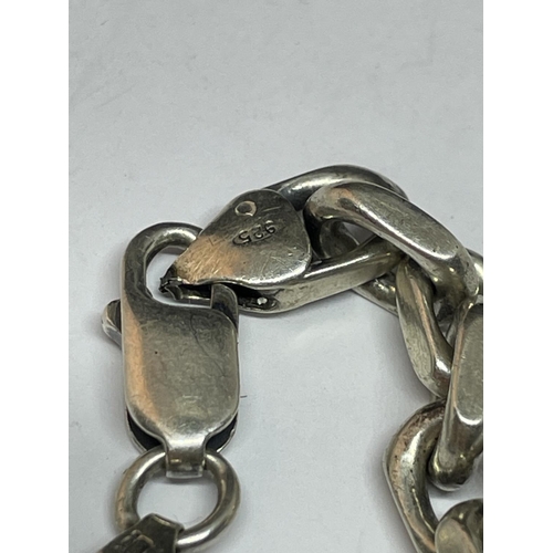 600 - A SILVER WRIST CHAIN