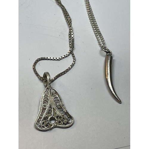 607 - FOUR SILVER NECKLACES WITH PENDANTS