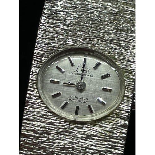 610 - A LIMIT WRIST WATCH IN A PRESENTATION BOX SEEN WORKING BUT NO WARRANTY