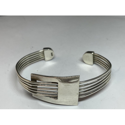 616 - TWO SILVER BANGLES