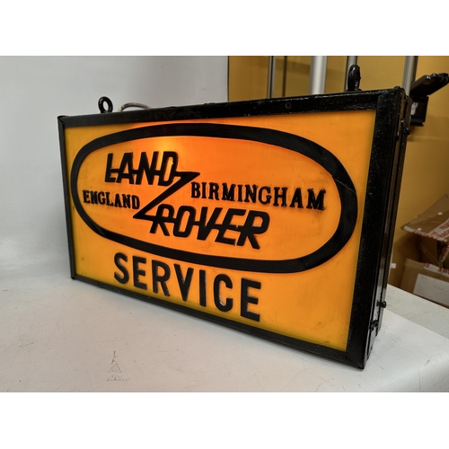 50 - A DOUBLE SIDED LAND ROVER SERVICE BIRMINGHAM ENGLAND ILLUMINATED SIGN COMPLETE WITH HANGING BRACKET