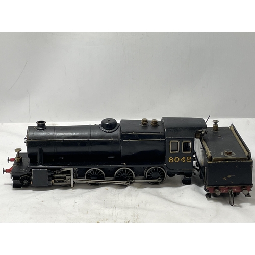 311 - A SCRATCH BUILT LIVE STEAM 30 MM GAUGE 2-8-0 MODEL RAILWAY LOCOMOTIVE AND TENDER NUMBER 8042 IN BLAC... 