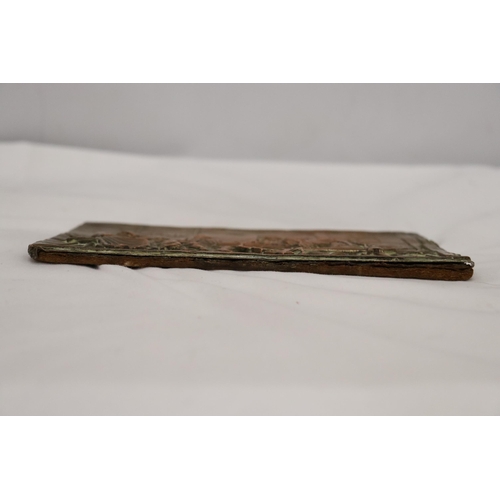 110 - AN ANTIQUE GERMAN COPPER AND BRASS WALL PLAQUE, 20CM X 16CM
