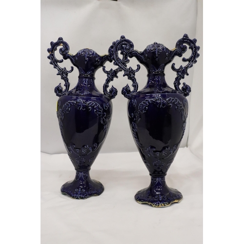 114 - A PAIR OF VICTORIAN VASES IN COBALT BLUE WITH PICTORIAL DECORATION, HEIGHT 41 CM