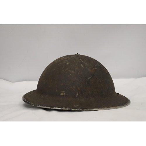 118 - A 1939-45 WAR PERIOD W. M. E. HELMET