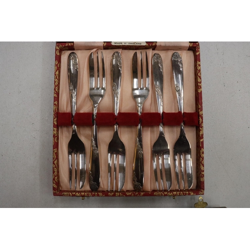 145 - TWO BOXED VINTAGE FLATWARE SETS