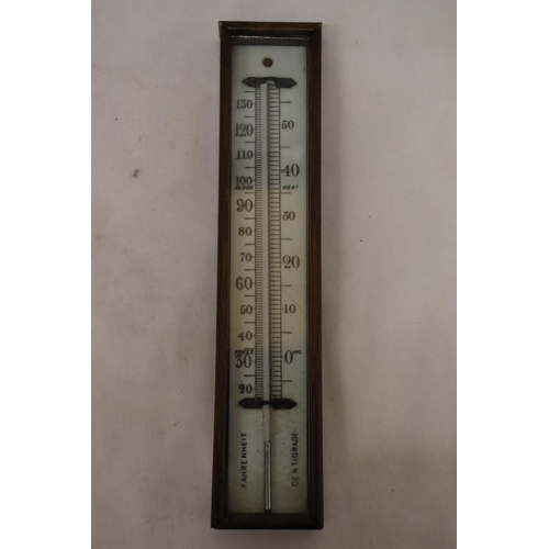 148 - A VINTAGE WALL HANGING THERMOMETER WITH WOODEN CASING
