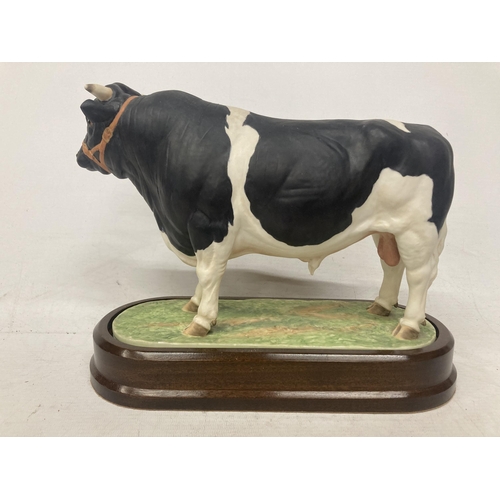 710 - A ROYAL WORCESTER MODEL OF A BRITISH FRESIAN BULL MODELLED BY DORIS LINDNER AND PRODUCED IN A LIMITE... 