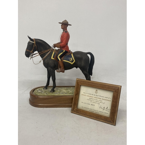 712 - A ROYAL WORCESTER MODEL OF A ROYAL CANADIAN MOUNTED POLICEMAN  MODELLED BY DORIS LINDNER AND PRODUCE... 