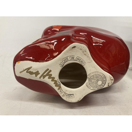 760 - AN ANITA HARRIS SKULL SIGNED IN GOLD