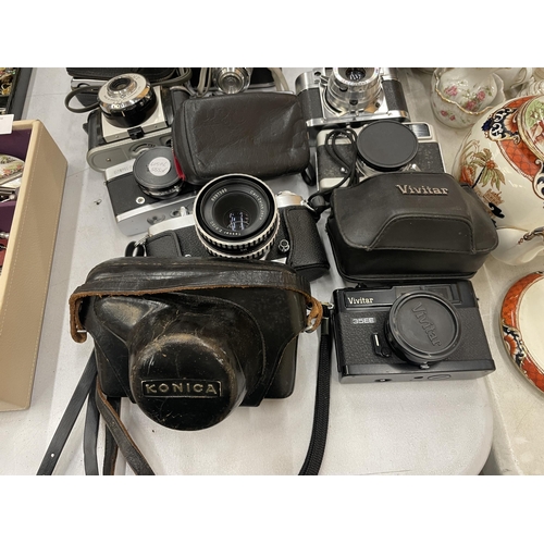 164 - A COLLECTION OF VINTAGE CAMERAS TO INCLUDE NIKKOREX, RICOH, KONICA, COMET, VIVITAR, OLYMPUS, ETC - A... 