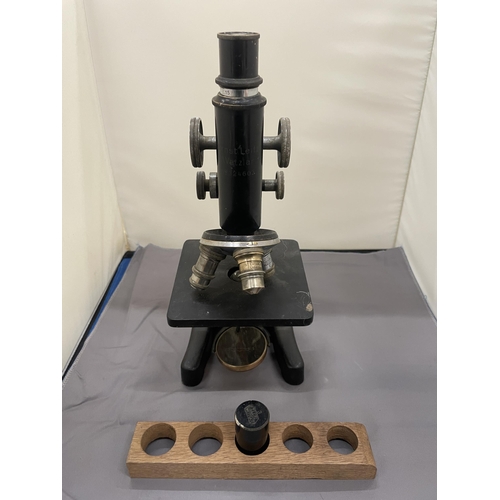172 - AN ERNST LEITZ WETZLAR MICROSCOPE, NO. 324603, WITH WOOD TRAY AND SPARE LENS