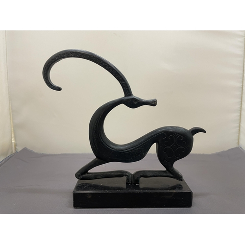 184 - A BRONZE SCULPTURE OF A GRACEFUL IBEX ON A MARBLE BASE, HEIGHT 15CM, WIDTH 12CM