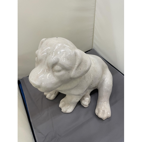 185 - A LARGE CERAMIMC MODEL OF A PUPPY DOG, HEIGHT 26CM, WIDTH 25CM