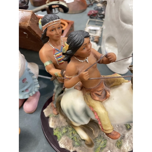 186 - A LARGE JULIANA MODEL OF TWO NATIVE AMERICANS AND A HORSE, HEIGHT 28CM, WIDTH 27CM