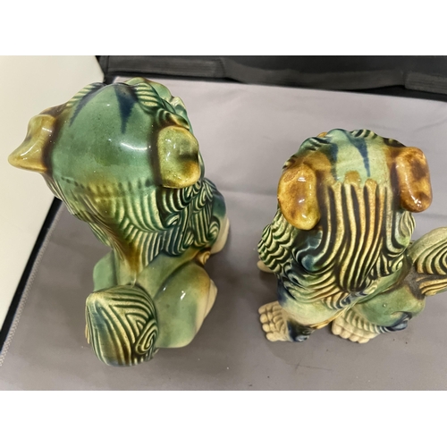 187 - TWO CERAMIC FOO DOGS, HEIGHTS 15CM