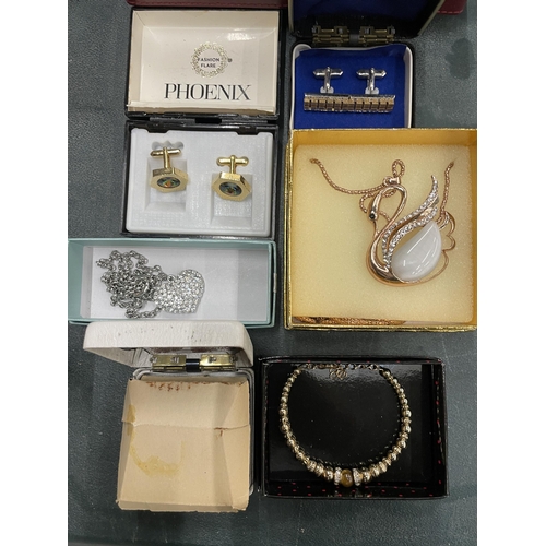 212 - A QUANTITY OF COSTUME JEWELLERY TO INCLUDE BRACELETS, NECKLACES, BROOCHES, CUFFLINKS, ETC, SOME BOXE... 