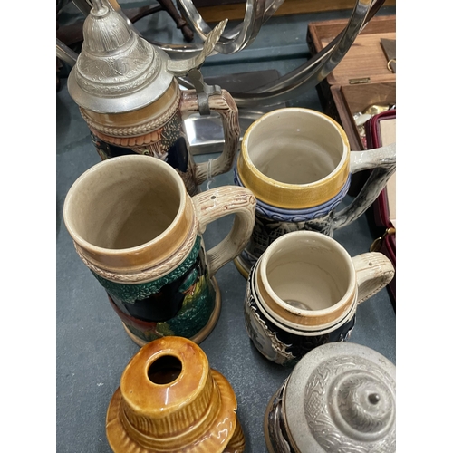 214 - A COLLECTION OF VINTAGE STEIN TANKARDS, ETC - 9 IN TOTAL