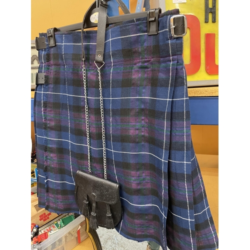 219 - A SCOTTISH KILT AND SPORRAN