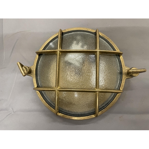 238 - A ROUND BRASS WALL LIGHT, DIAMETER 18CM