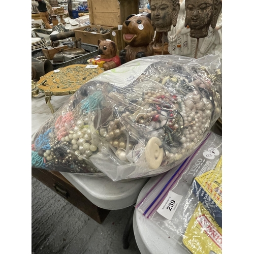 242 - A LARGE QUANTITY OF MIXED COSTUME JEWELLERY TO INCLUDE BEADS, ETC - 10KG IN TOTAL