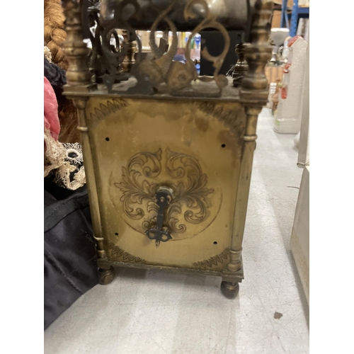 268 - A VINTAGE BRASS LANTERN CLOCK, HEIGHT 25CM