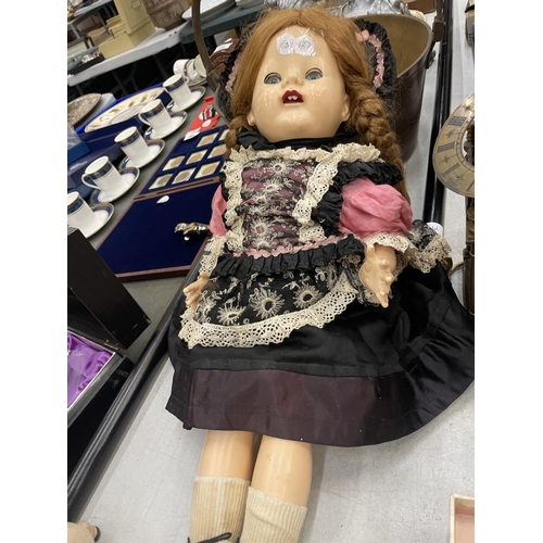 270 - A VINTAGE 1950'S DOLL WITH SLEEPY EYES