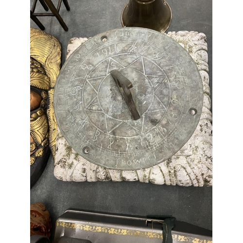 275 - A BRASS SUN DIAL ON A CONCRETE BASE