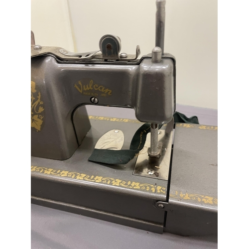 276 - A VINTAGE VULCAN SMALL SEWING MACHINE