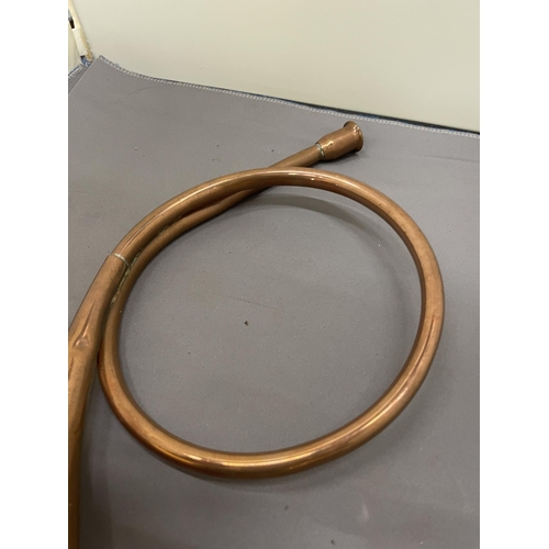 277 - A COPPER, COILED HUNTING HORN