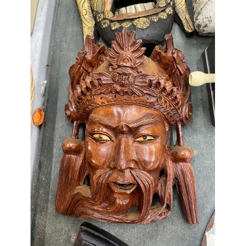 280 - TWO WOODEN WALL MASKS