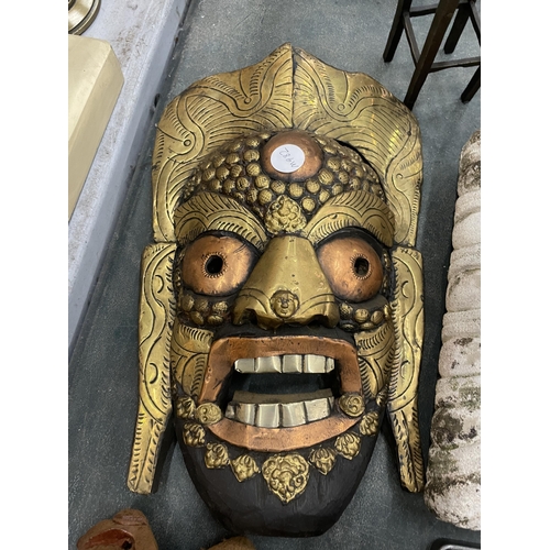 280 - TWO WOODEN WALL MASKS