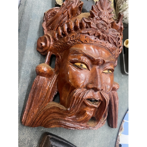 280 - TWO WOODEN WALL MASKS